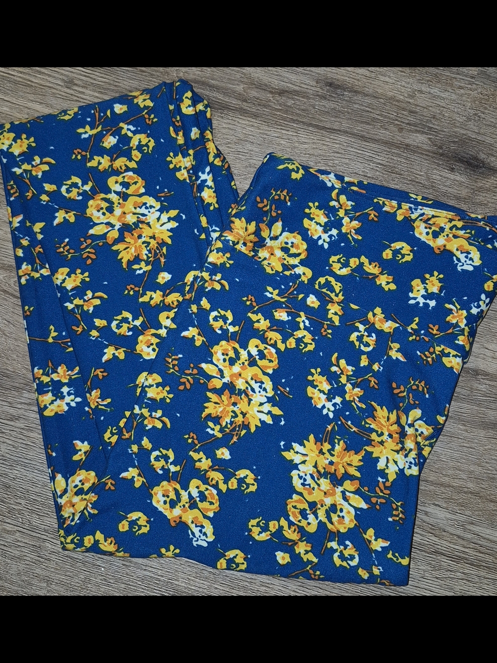 LuLaRoe Navy Leggings with Yellow Floral Print